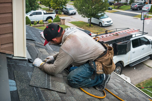 Professional Gutter Repair And Installation technician working in Centreville, MI